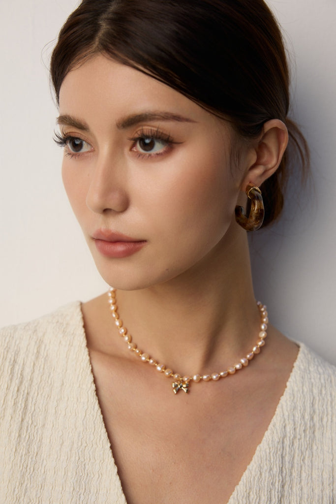 Pink Pearl Necklace with Bow Pendant D0583