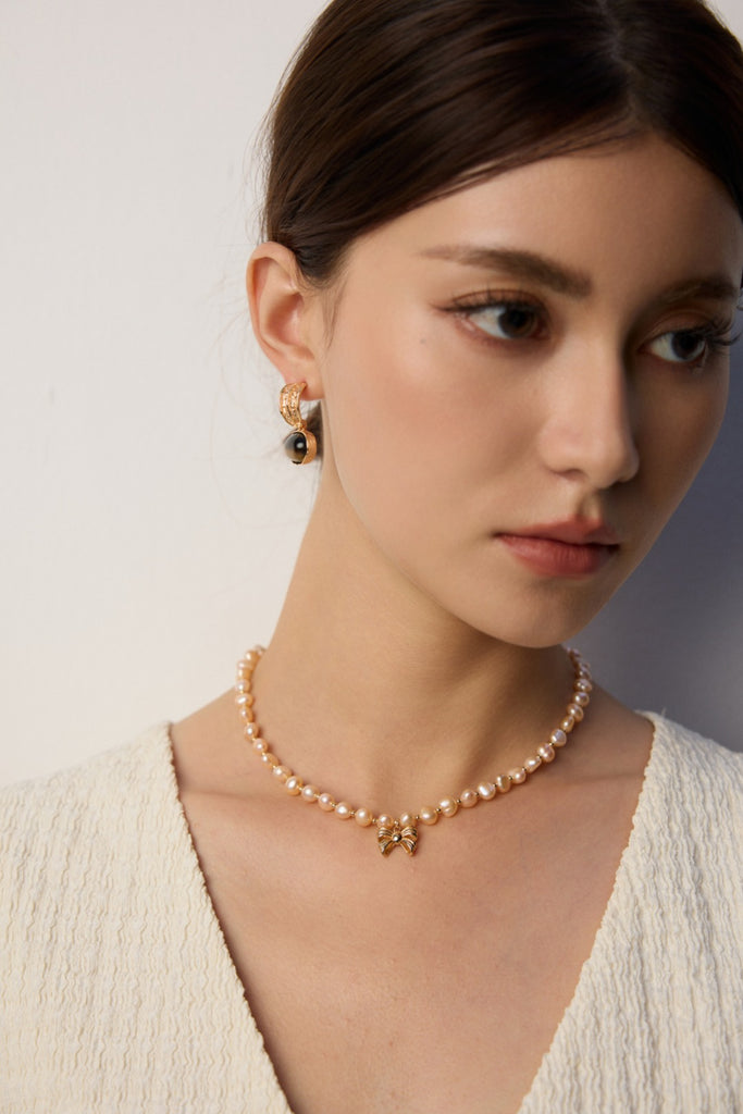 Pink Pearl Necklace with Bow Pendant D0583