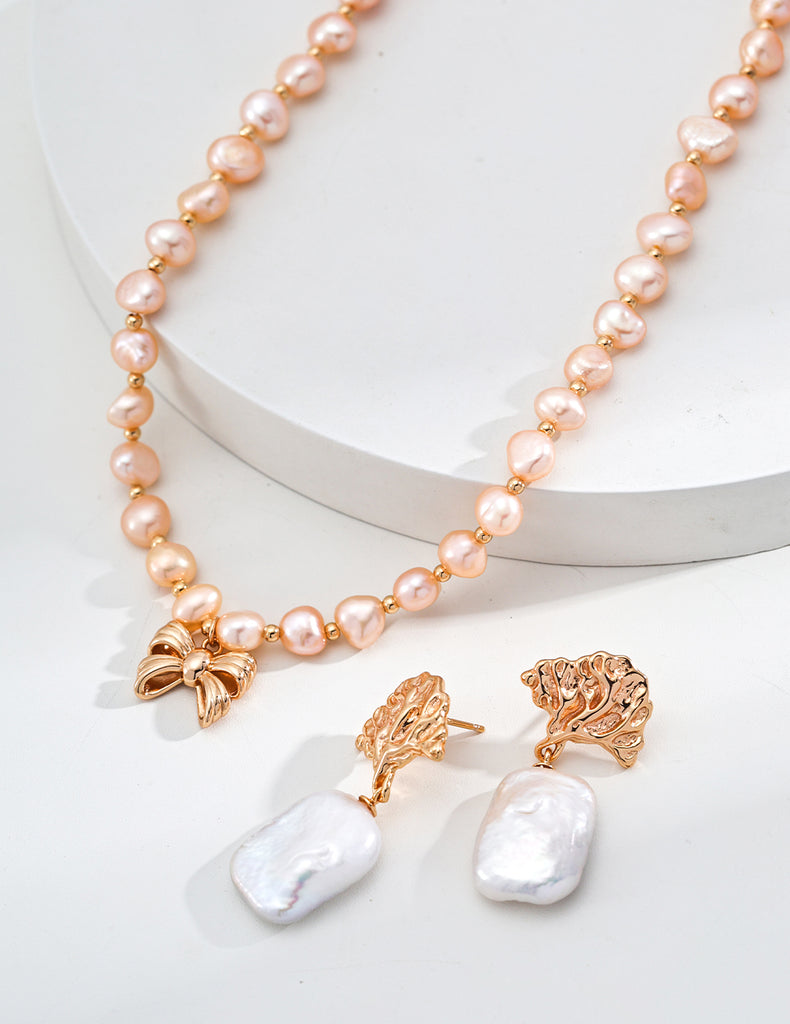 Pink Pearl Necklace with Bow Pendant D0583