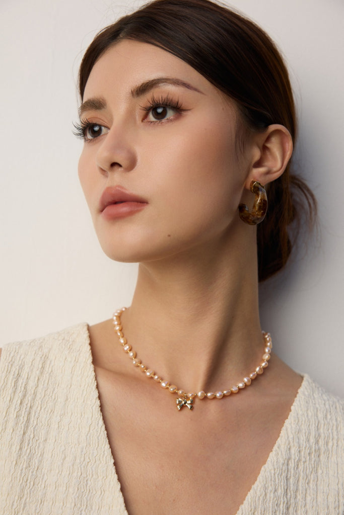 Pink Pearl Necklace with Bow Pendant D0583