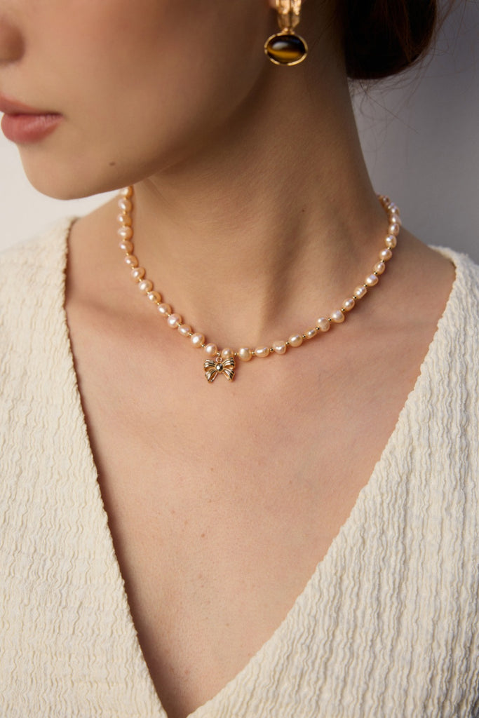 Pink Pearl Necklace with Bow Pendant D0583